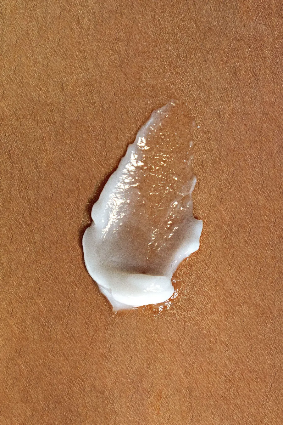 Trace de crème sur fond beige